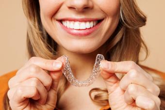 How to Clean Your Invisalign Retainers (& Why It’s So Important)